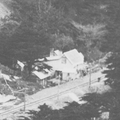 Detail of Woodlands, the Broderick house, during railway construction.